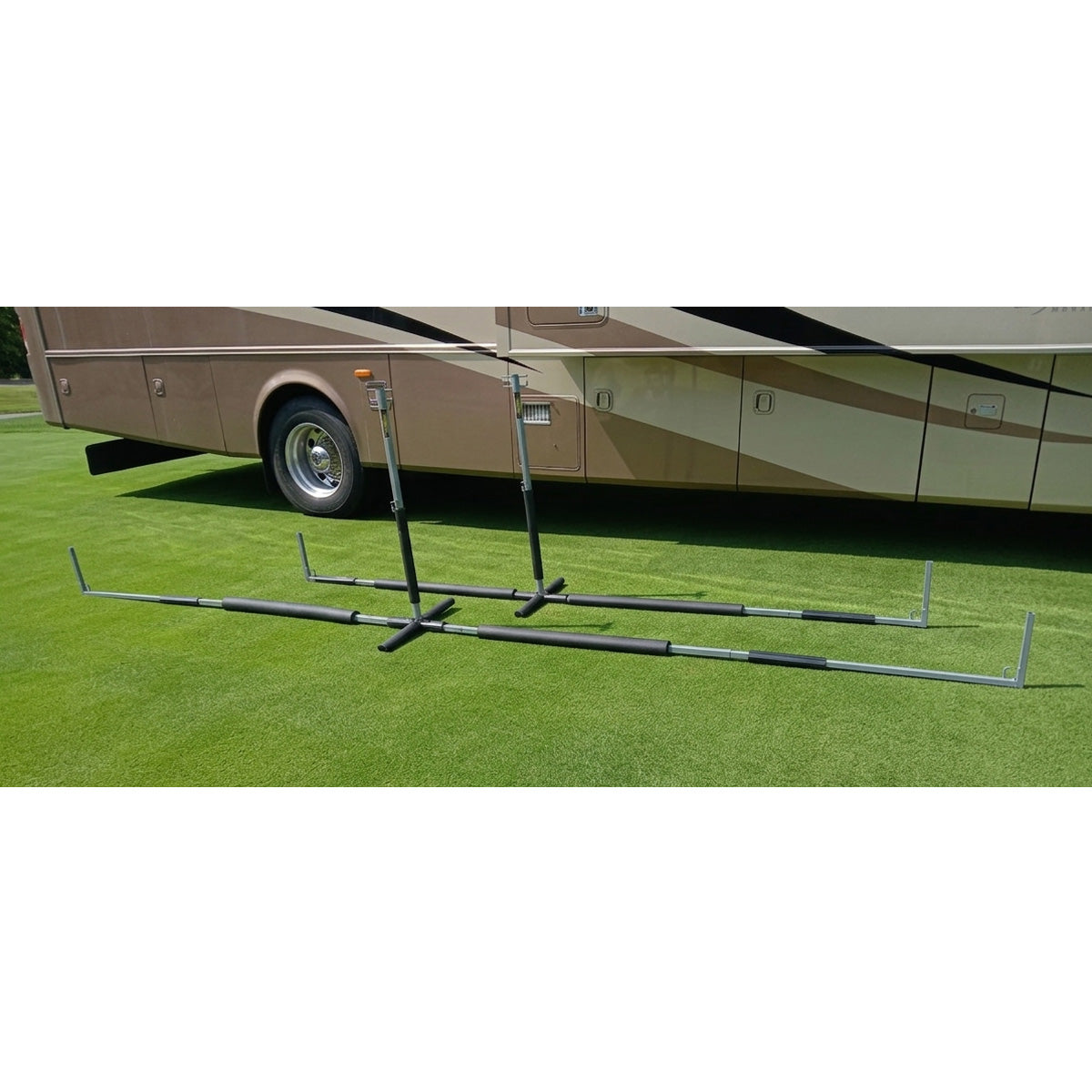 Hovershade front and back canopy awning frame next to each other by a 40 foot rv