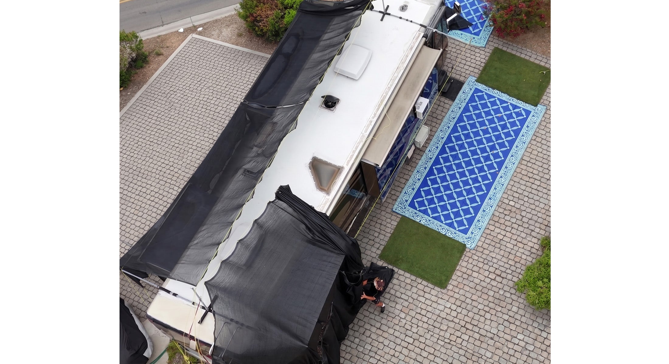 Hovershade with shade open over an RV