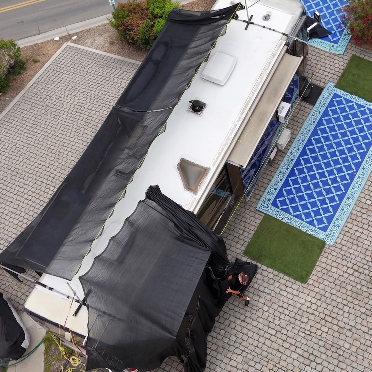 Hovershade frame and shade setup pulling the shade open like a curtain